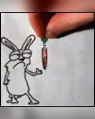 A pencil drawing a small rabbit onto a sheet of paper
